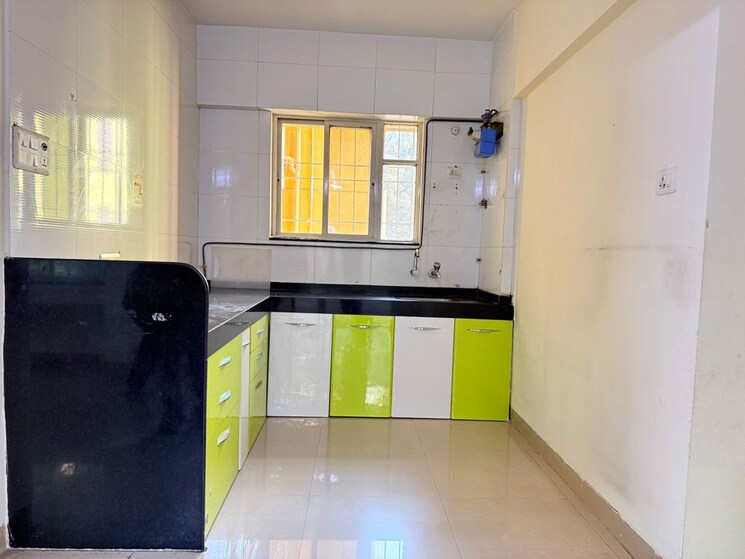 Kitchen, bhansali-whispering-winds 2 Bedroom 682 Sq.Ft. Apartment In Pashan Pune 9781947