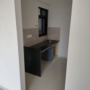 Kitchen in 2 BHK Apartment at Marathon Nexworld Aura, Betwade – for Rent