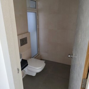 Bathroom in 2 BHK Apartment at Marathon Nexworld Aura, Betwade – for Rent