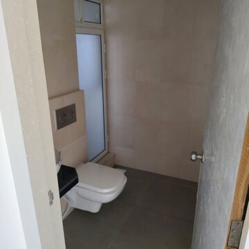 Bathroom in 2 BHK Apartment at Marathon Nexworld Aura, Betwade – for Rent