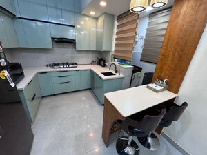 Kitchen in 3 BHK Apartment at Amrapali Platinum, Sector 119 – for Sale