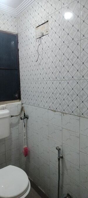 Bathroom in 2 BHK Apartment at Janakpuri – for Rent