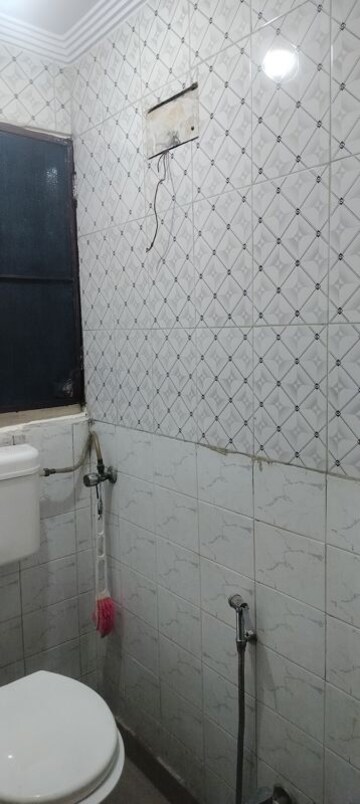 Bathroom in 2 BHK Apartment at Janakpuri – for Rent