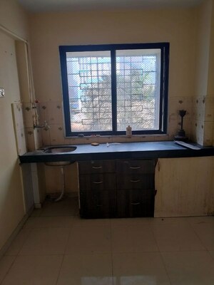 Kitchen in 1 BHK Apartment at RNA NG Regency Phase I, Balkum Pada – for Rent
