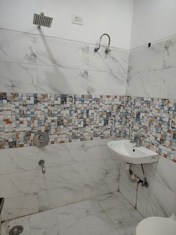 Bathroom in 3 BHK Builder Floor at Dhakoli – for Sale