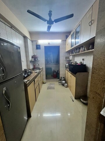 Kitchen in 1 BHK Apartment at Heena Presidency, Mira Road – for Sale