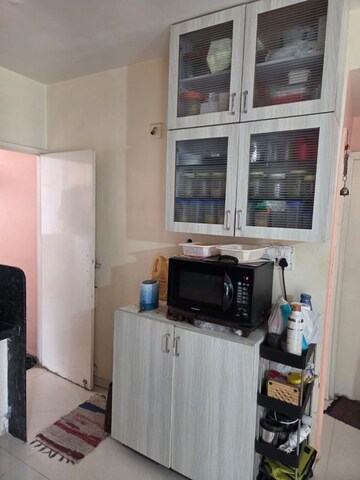 Kitchen in 3 BHK Apartment at Poddar Palm Greens, Makarba – for Rent