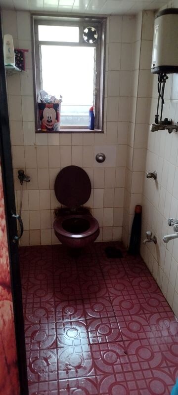 Bathroom in 1 BHK Apartment at Gaurav Presidency, Mira Road – for Rent