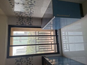 Kitchen in 1 BHK Apartment at Raunak Heights, Ghodbunder Road – for Rent