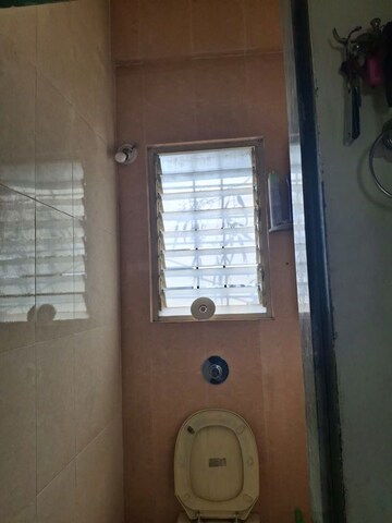 Bathroom in 1 BHK Apartment at Onnyyx Sai Villa, Wadgaon Sheri – for Sale