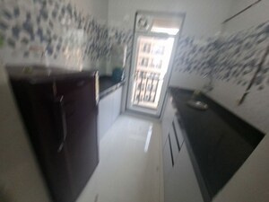 Kitchen in 1 BHK Apartment at Raunak Heights, Ghodbunder Road – for Rent