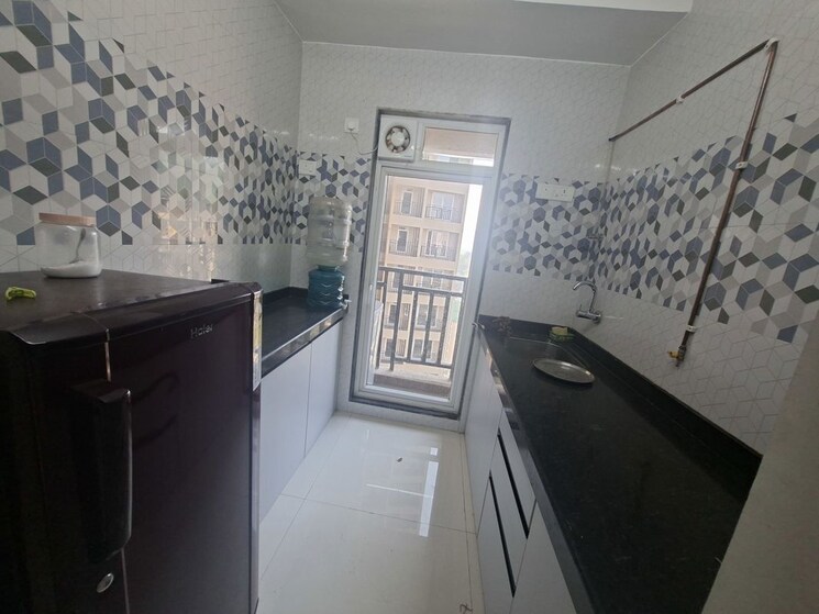 Kitchen, raunak-heights 1 Bedroom 410 Sq.Ft. Apartment In Ghodbunder Road Thane 9783768