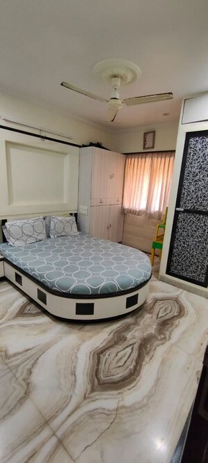 Master Bedroom in 2 BHK Apartment at Adinath Building, Masjid Bunder – for Sale