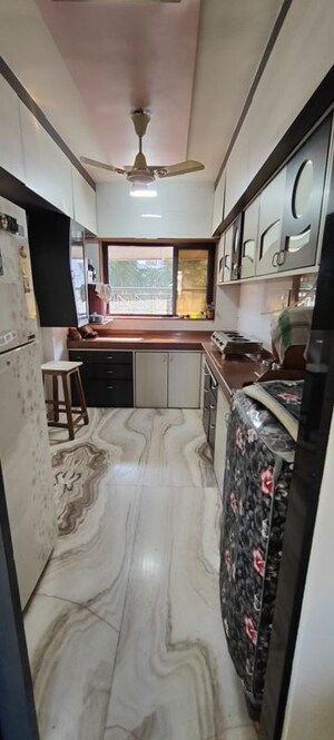 Kitchen in 2 BHK Apartment at Adinath Building, Masjid Bunder – for Sale