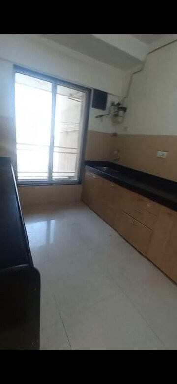 Kitchen in 3 BHK Apartment at Rustomjee OZone, Goregaon West – for Rent