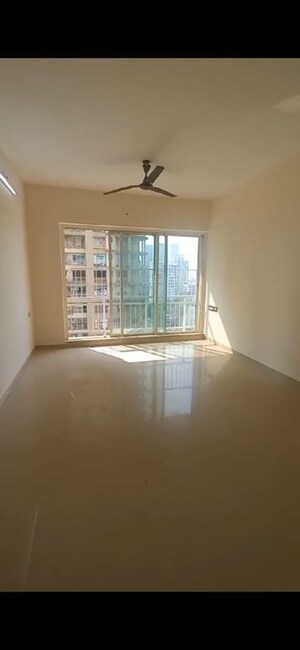 Living Room in 3 BHK Apartment at Rustomjee OZone, Goregaon West – for Rent