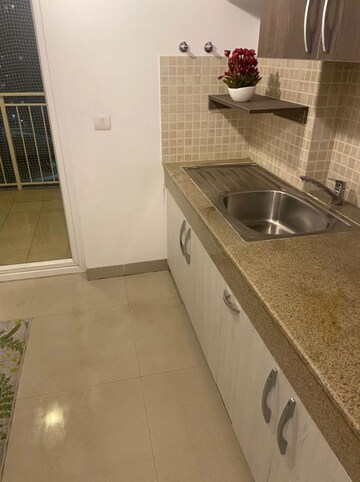 Kitchen in 3.5 BHK Apartment at Emaar Gurgaon Greens, Sector 102 – for Sale