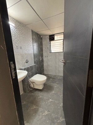 Bathroom in 3 BHK Apartment at Paranjape Azure, Tathawade – for Rent