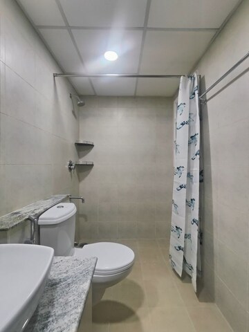 Bathroom in  Apartment at Bhartiya Nikoo Homes Phase 2, Thanisandra Main Road – for Rent