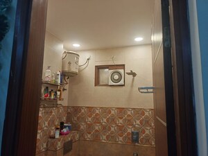 Bathroom in 3 BHK Apartment at Tomar Colony – for Sale