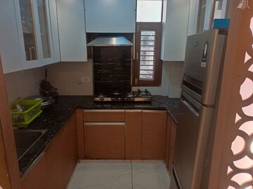 Kitchen in 3 BHK Apartment at Tomar Colony – for Sale