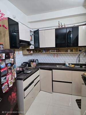 Kitchen in 2 BHK Apartment at Godrej Green Cove, Mahalunge – for Rent