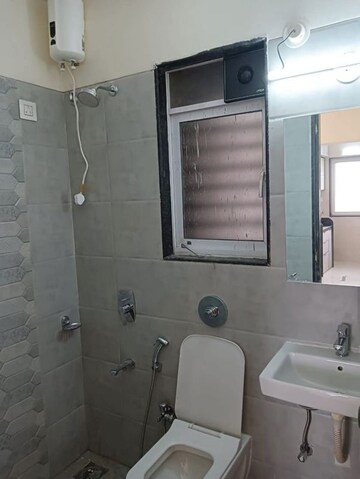 Bathroom in 2 BHK Apartment at Aashna Samadhan, Goregaon West – for Rent