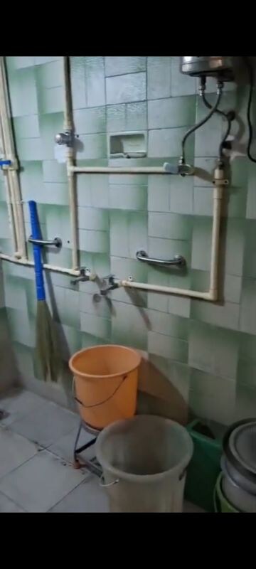 Bathroom in 1 BHK Apartment at Gomantak CHS, Navpada – for Rent