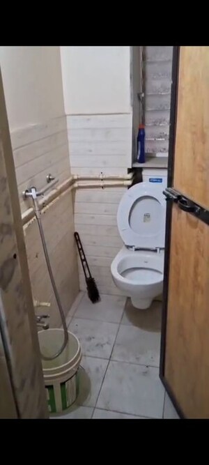 Bathroom in 1 BHK Apartment at Gomantak CHS, Navpada – for Rent