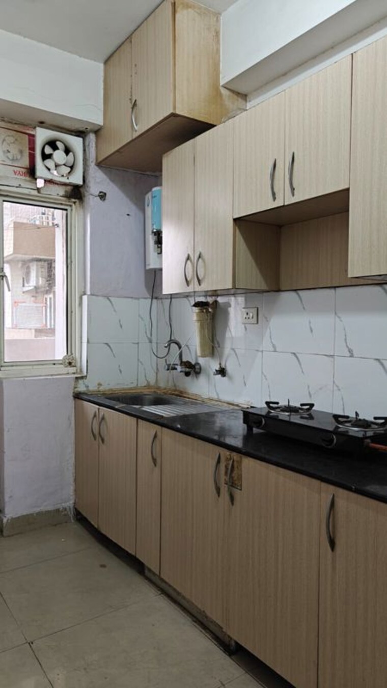 Kitchen, aditya-celebrity-homes 1 Bedroom 550 Sq.Ft. Apartment In Sector 76 Noida 9784495