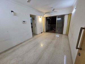 Room in 2 BHK Apartment at Pratham ARC Aura, Andheri West – for Rent