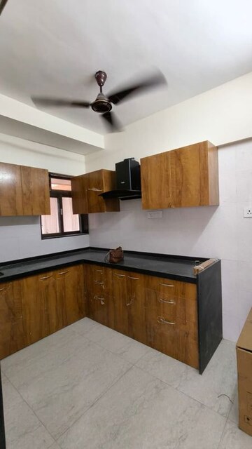 Kitchen in 2 BHK Apartment at Pratham ARC Aura, Andheri West – for Rent