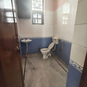 Bathroom in 2 BHK Builder Floor at Unitech Cyber Park, Durga Colony – for Rent
