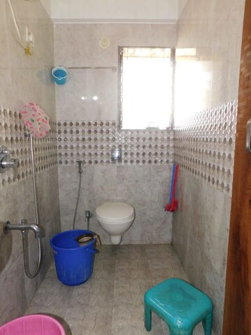 Bathroom in 1 BHK Apartment at Raunak Unnathi Woods Phase 6, Ghodbunder Road – for Sale