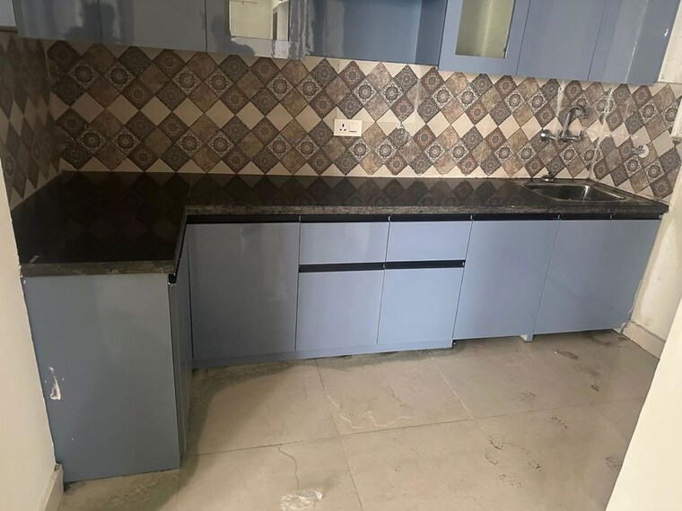 Kitchen, signature-the-millennia-3 2 Bedroom 661 Sq.Ft. Apartment In Sector 37d Gurgaon 9785637