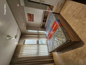 Bedroom in 2 BHK Apartment at Hiranandani Castle Rock, Powai – for Rent