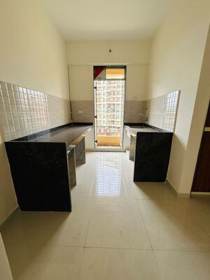 Kitchen in 2 BHK Apartment at Panvelkar Estate Oxford, Badlapur East – for Sale