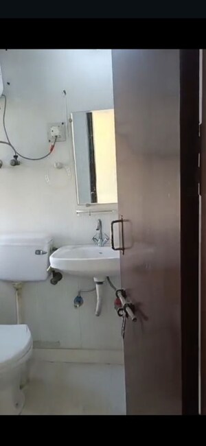 Bathroom in 3 BHK Apartment at Sector 10 Dwarka – for Rent