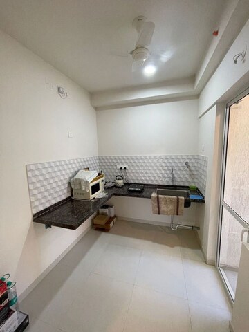 Kitchen in 2 BHK Apartment at Godrej Green Cove, Mahalunge – for Sale