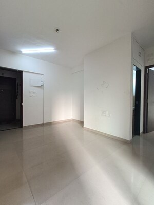 Living Room in 1 BHK Apartment at JP North Aviva, Mira Road – for Sale