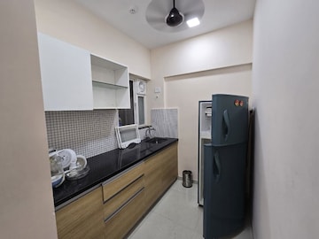 Kitchen in 2 BHK Apartment at Omkar Signet, Malad East – for Rent