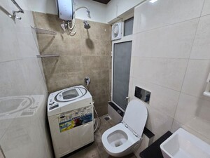 Bathroom in 2 BHK Apartment at Omkar Signet, Malad East – for Rent