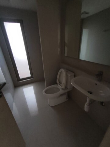 Living Room in 2.5 BHK Apartment at Hiranandani Cardinal, Ghodbunder Road – for Sale