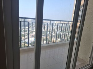 Balcony in 2 BHK Apartment at Amrapali Heartbeat City, Sector 107 – for Rent