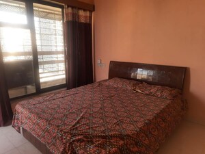 Bedroom in 2 BHK Apartment at Gurusamridhi Heights CHS, Sanpada – for Rent