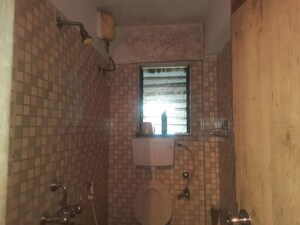 Bathroom in 2 BHK Apartment at Gurusamridhi Heights CHS, Sanpada – for Rent
