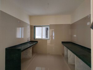 Kitchen in 2 BHK Apartment at Beauty Greenstone Heritage, Fort – for Rent