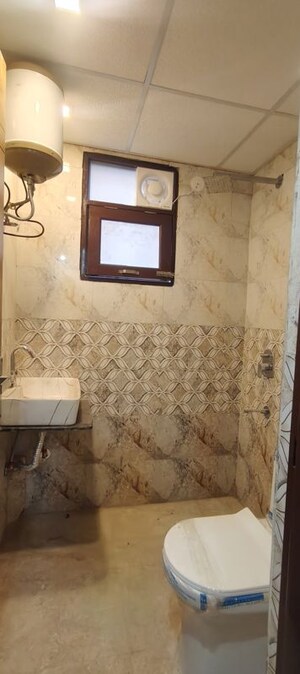 Bathroom in 2 BHK Builder Floor at Chattarpur – for Rent