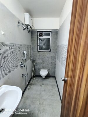 Bathroom in 1 BHK Apartment at Kishor Sukur Enclave A, Ghodbunder Road – for Sale
