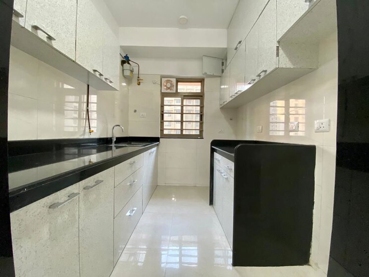 Kitchen, atul-blue-fortuna 2 Bedroom 719 Sq.Ft. Apartment In Andheri East Mumbai 9786578